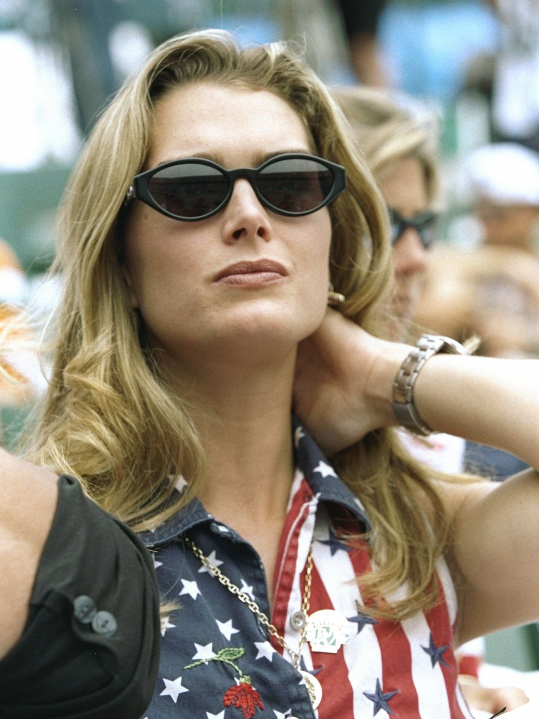 Actress Brooke Shields watches her boyfriend Andre Agassi play a the gold medal match against Sergi Brugera of Spain at the Stone Mountain Tennis Center during the Olympic Games in Atlanta