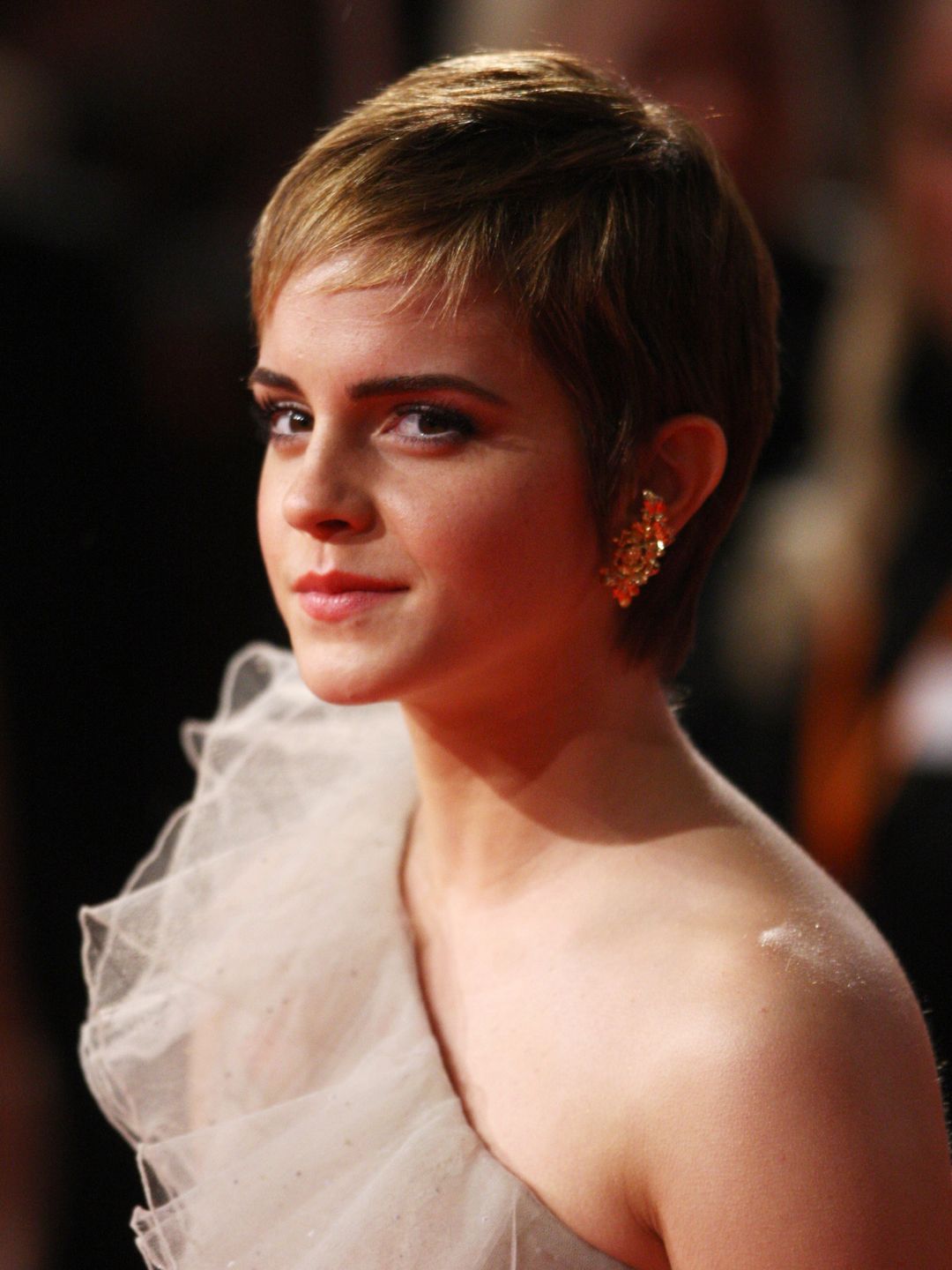 Emma Watson smiling at the BAFTAs 