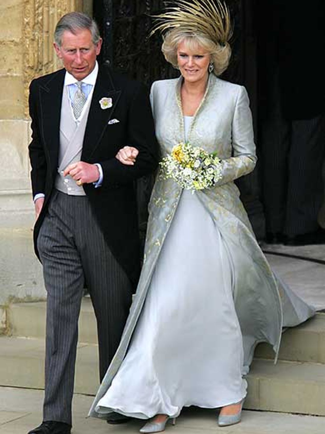 prince charles and camilla emerging from their wedding ceremony