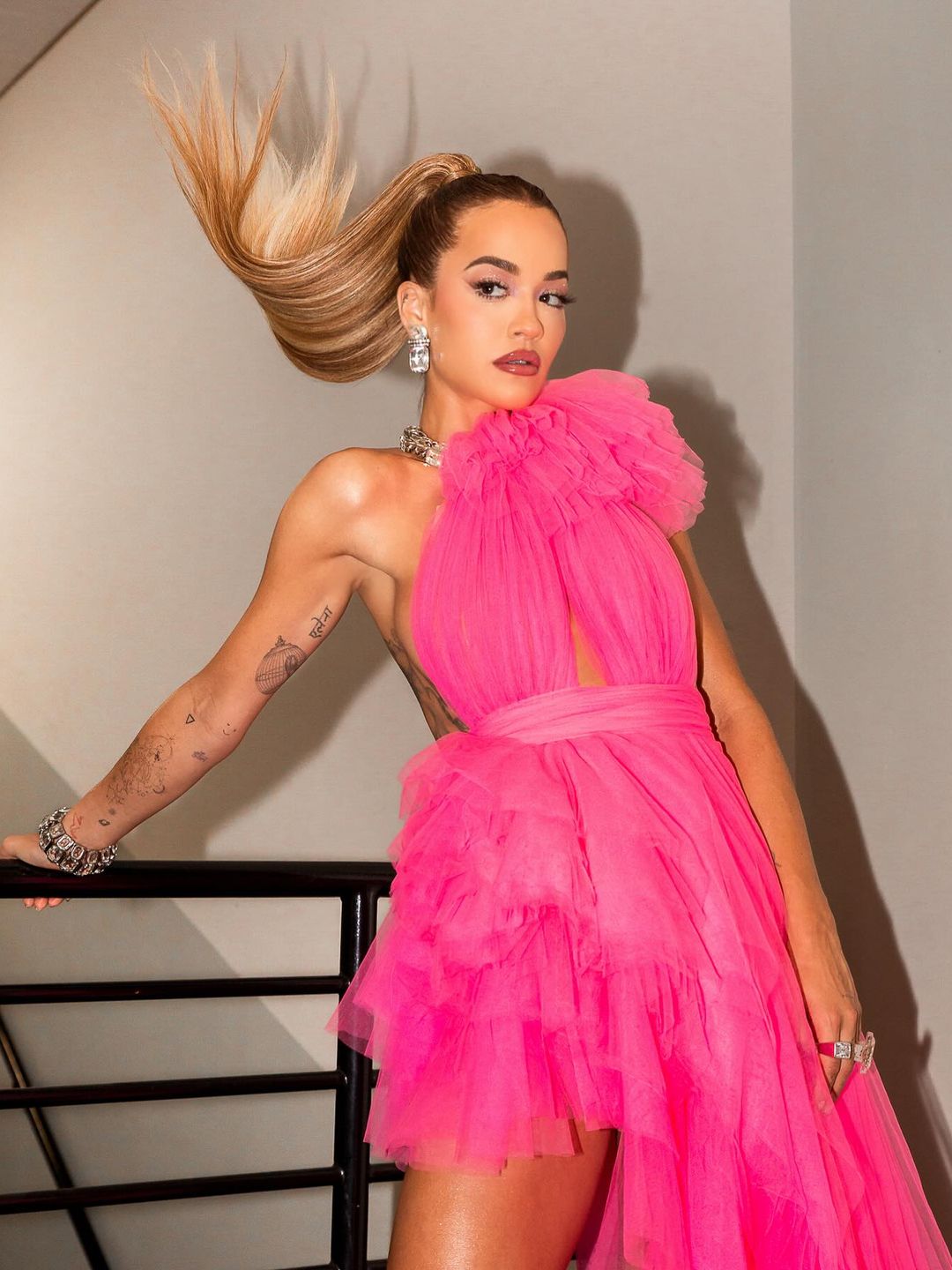 Rita Ora wears a bright Barbie pink tulle dress on her Instagram
