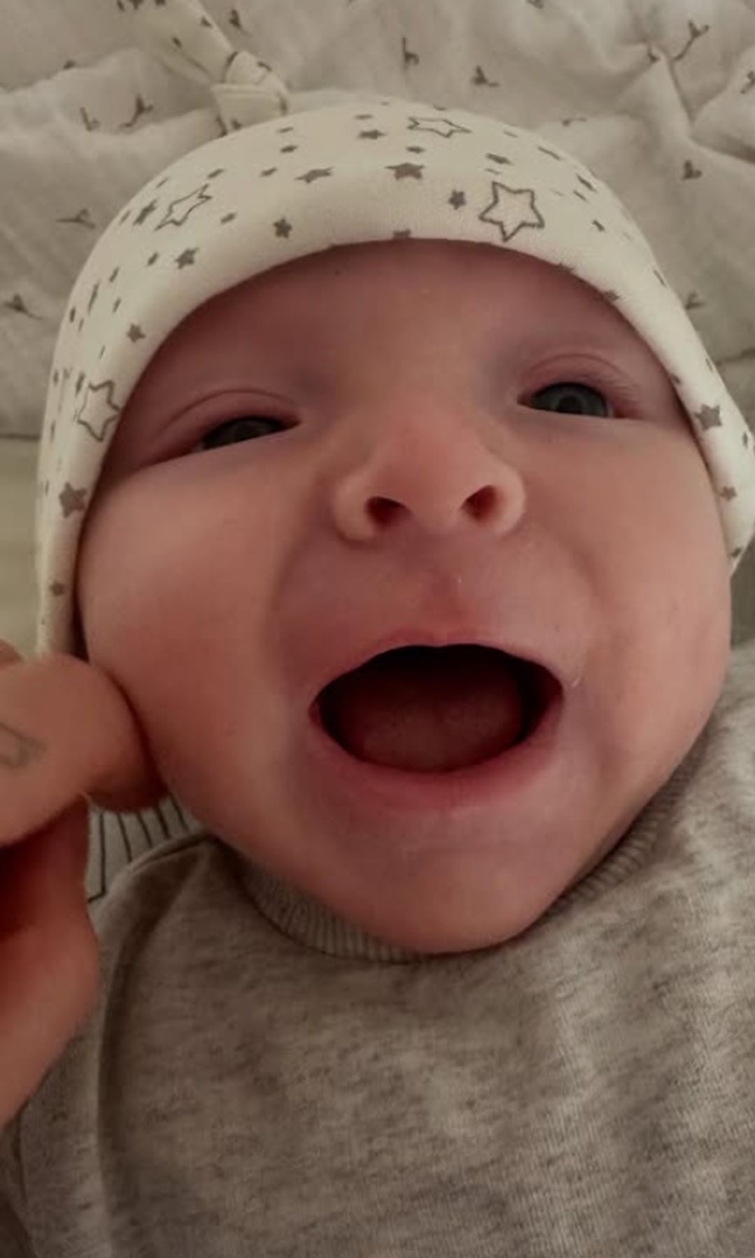 A baby boy smiling