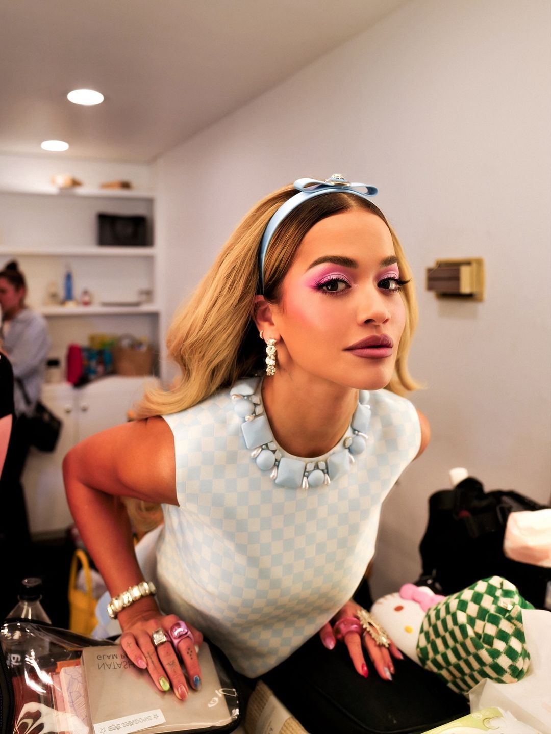 Rita Ora poses for a picture backstage while filming The Masked Singer US