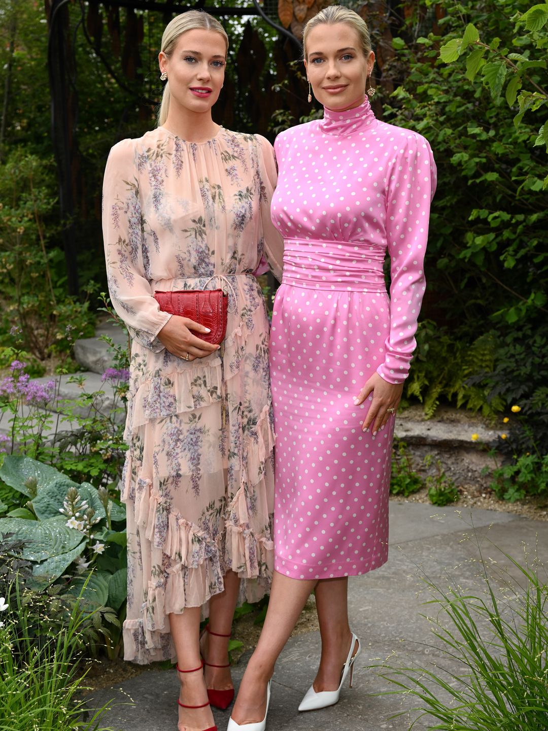 Lady Amelia and Eliza Spencer wearing printed dresses at the Chelsea Flower Show 
