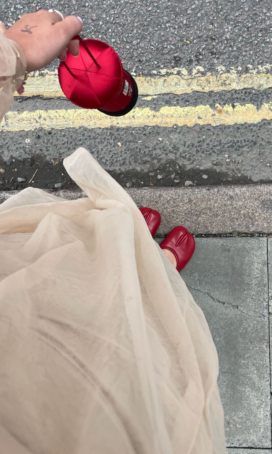red ballet flats with a tulle dress