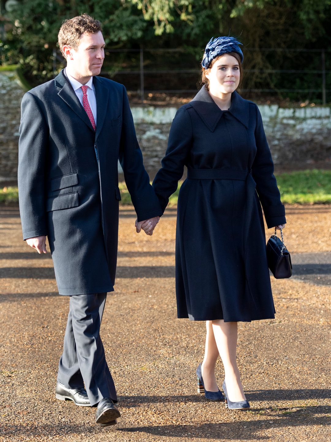 couple walking to church on christmas day 