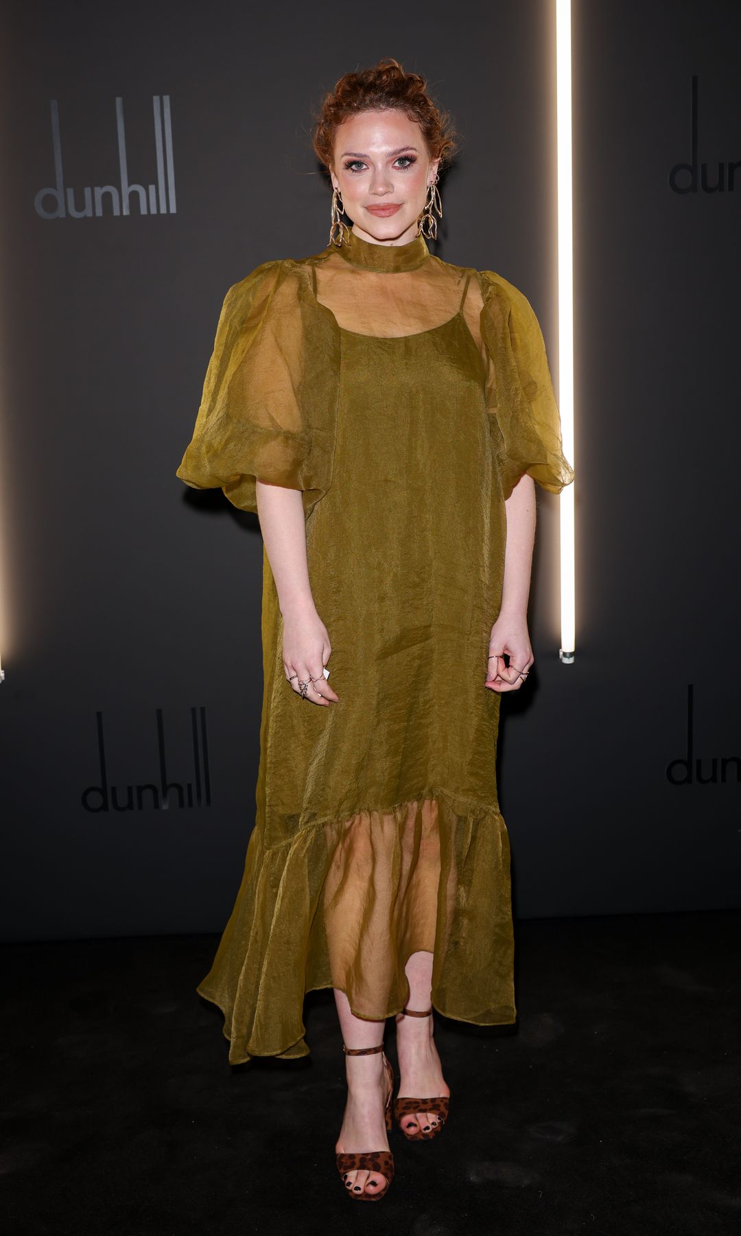 Katie Clarkson-Hill wearing a semi-sheer dress