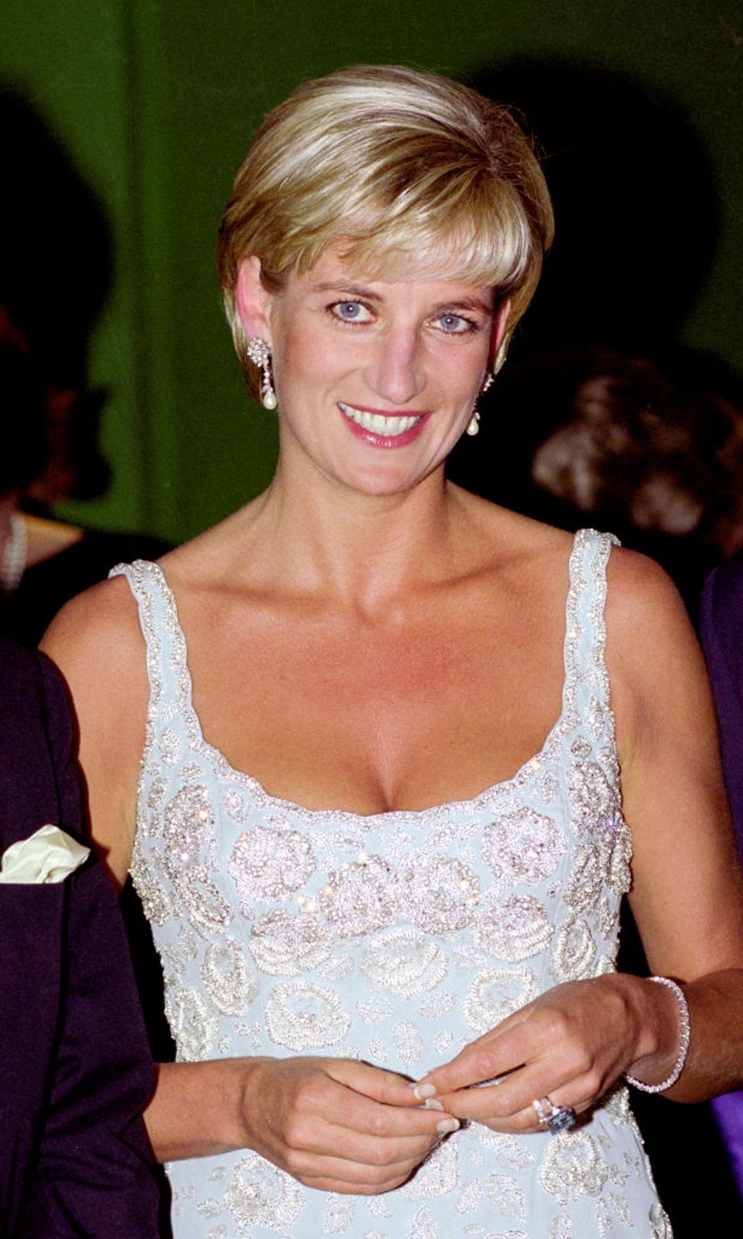 Princess Diana in a white embellished dress