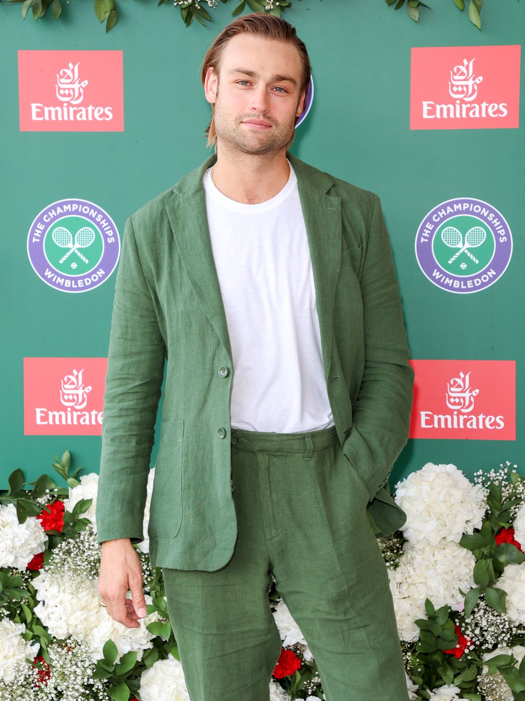 Douglas Booth green suit