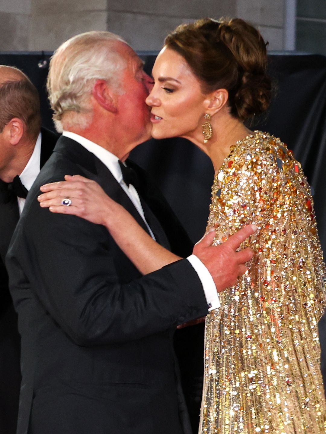 King Charles kisses Kate Middleton at James Bond premiere