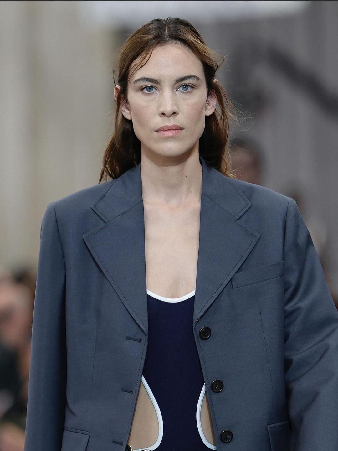 Alexa Chung walks the Miu Miu SS25 show during PFW