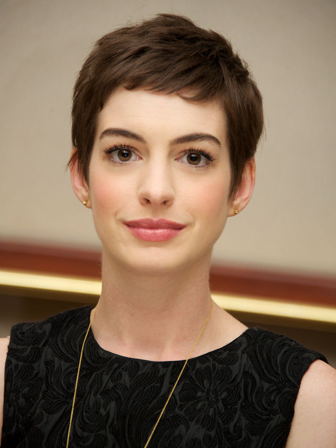 anne hathaway smiling in black dress