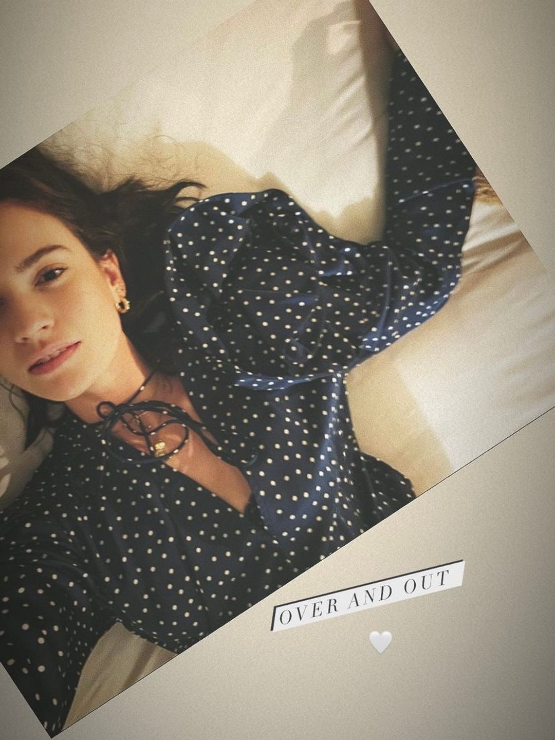 Lily James opted for a polka-dot blouse by Mango 