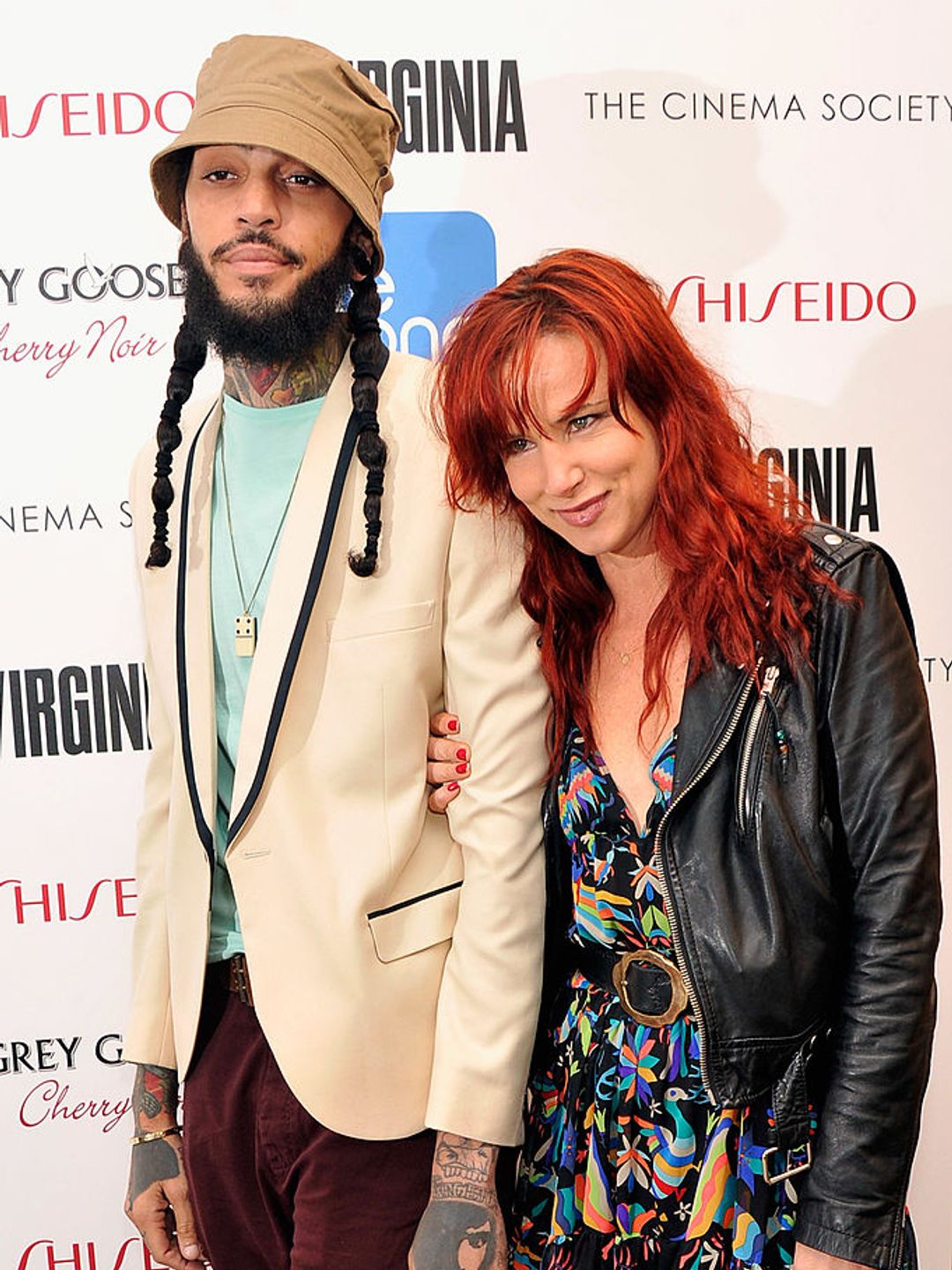 Juliette and rapper, Travie McCoy in 2012 on the red carpet. 
