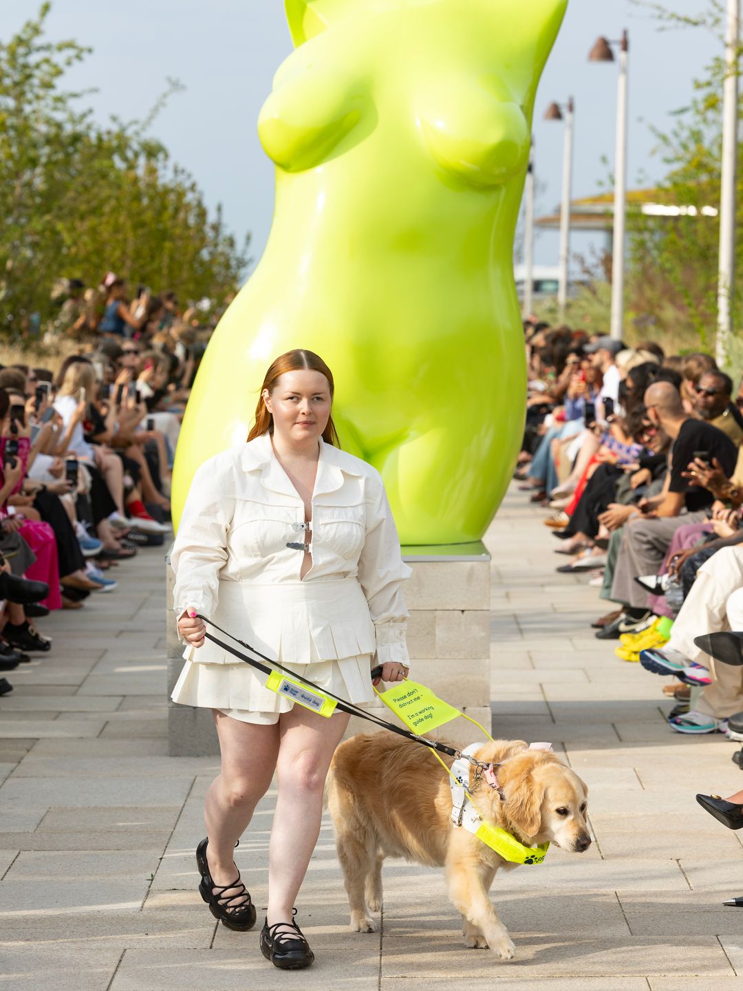 Lucy Edwards – accompanied by her guide dog – became the first blind person to model at Copenhagen Fashion Week