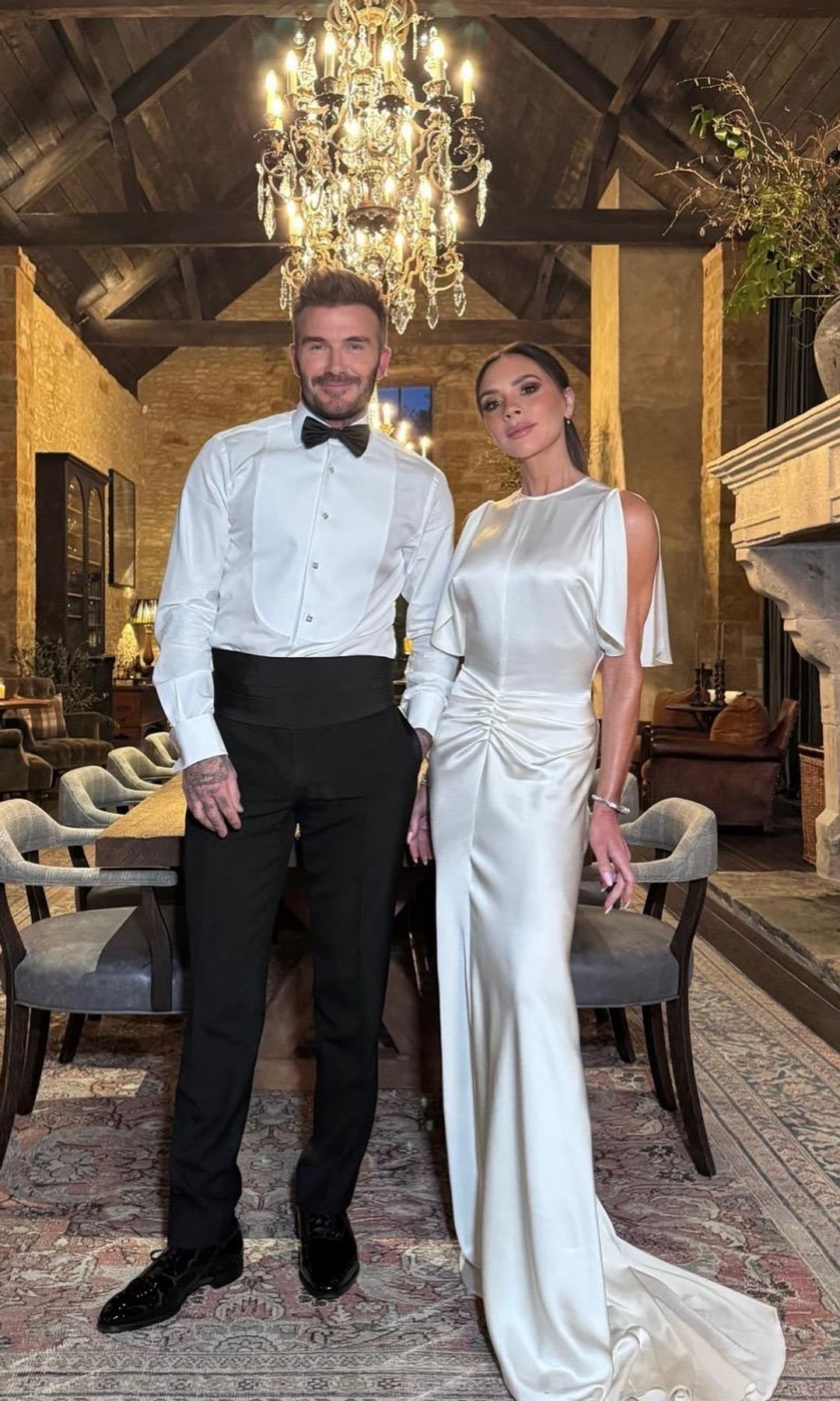 Victoria and David Beckham pose for a photo at King Charles and Queen Camilla's at Gloucestershire home
