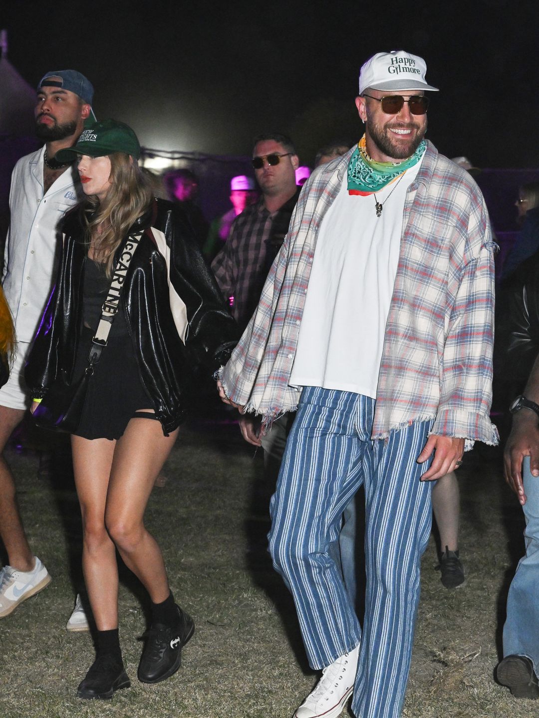 Taylor Swift and Travis Kelce at Neon Carnival held during the Coachella Music and Arts Festival on April 13, 2024 in Thermal, California. (Photo by Gilbert Flores/WWD via Getty Images)