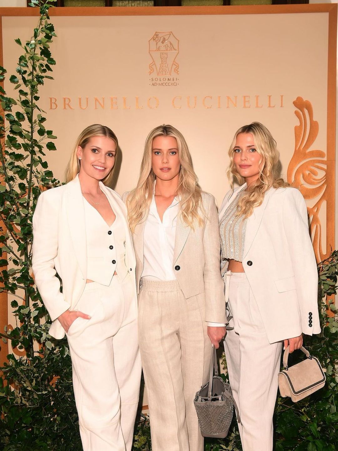 Lady Kitty, Amelia and Eliza Spencer all wearing summer suiting by Brunello Cucinelli