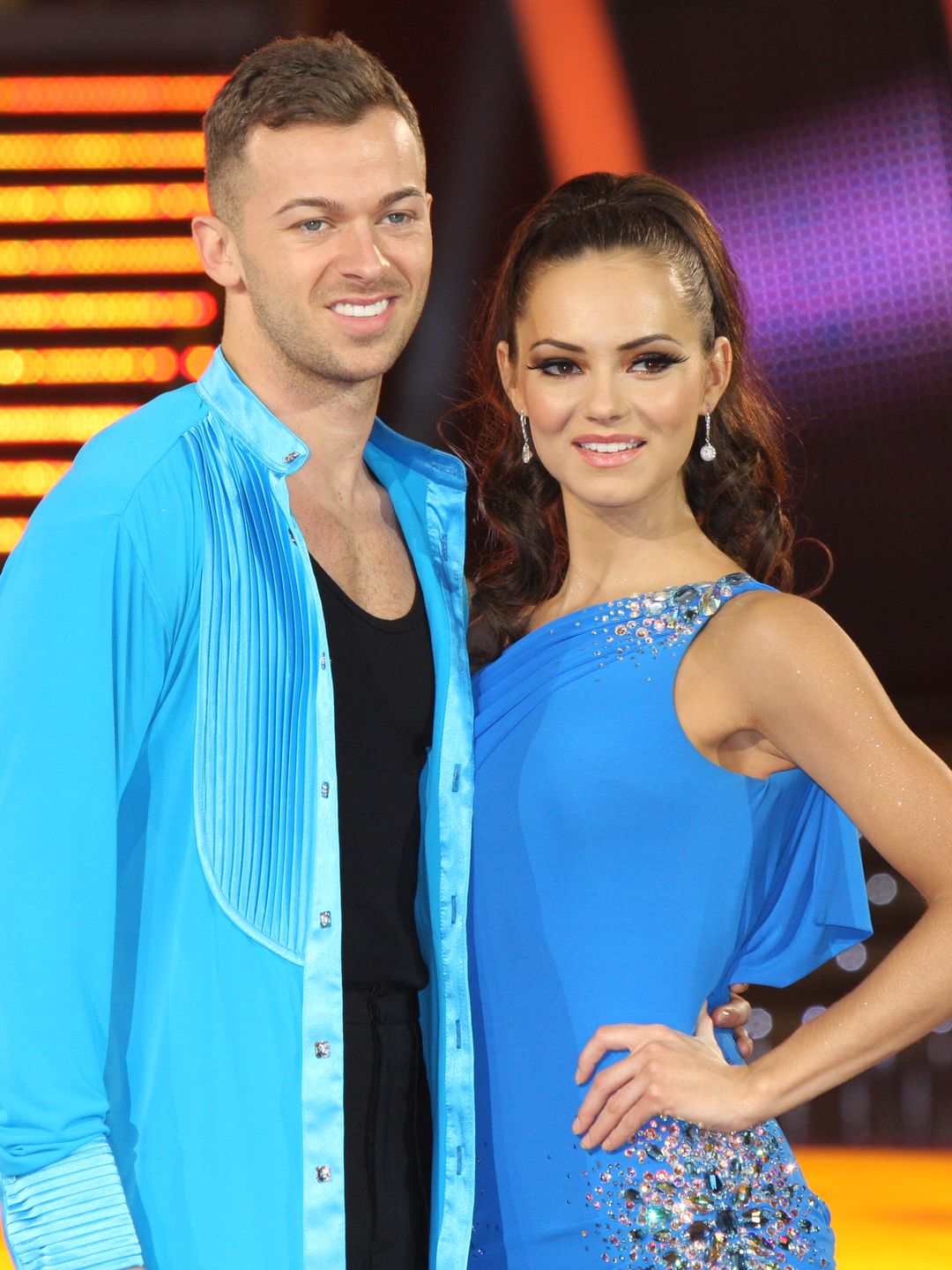 Artem Chigvintsev standing with Kara Tointon