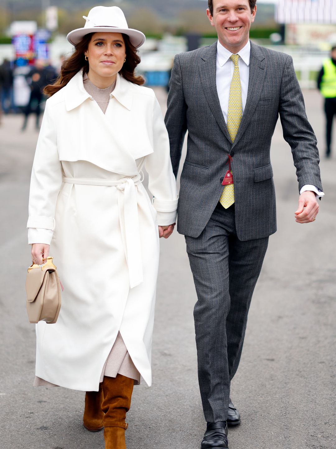 Princess Eugenie wears a white coat and hat to Cheltenham Festival 
