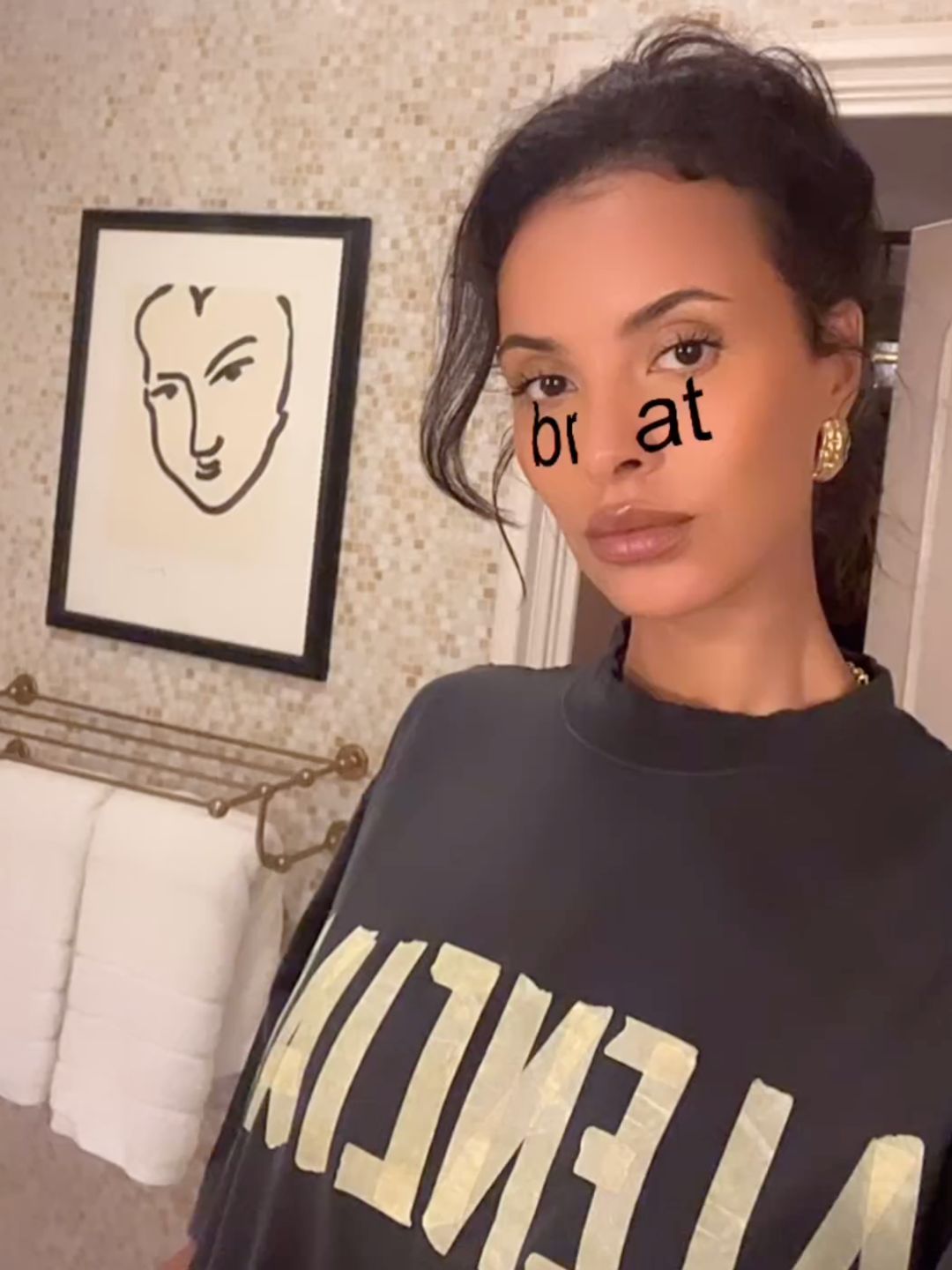 Maya Jama shares a video to her Instagram story of herself in the brat filter