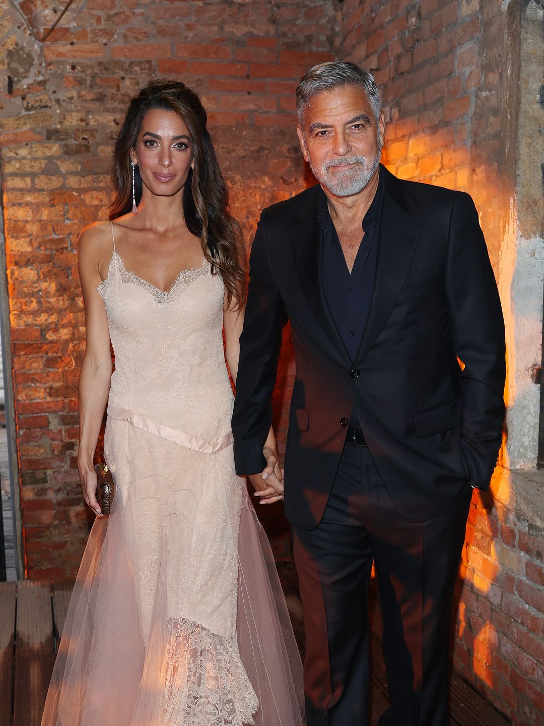 Amal Clooney and George Clooney attend the DVF Awards 2023 