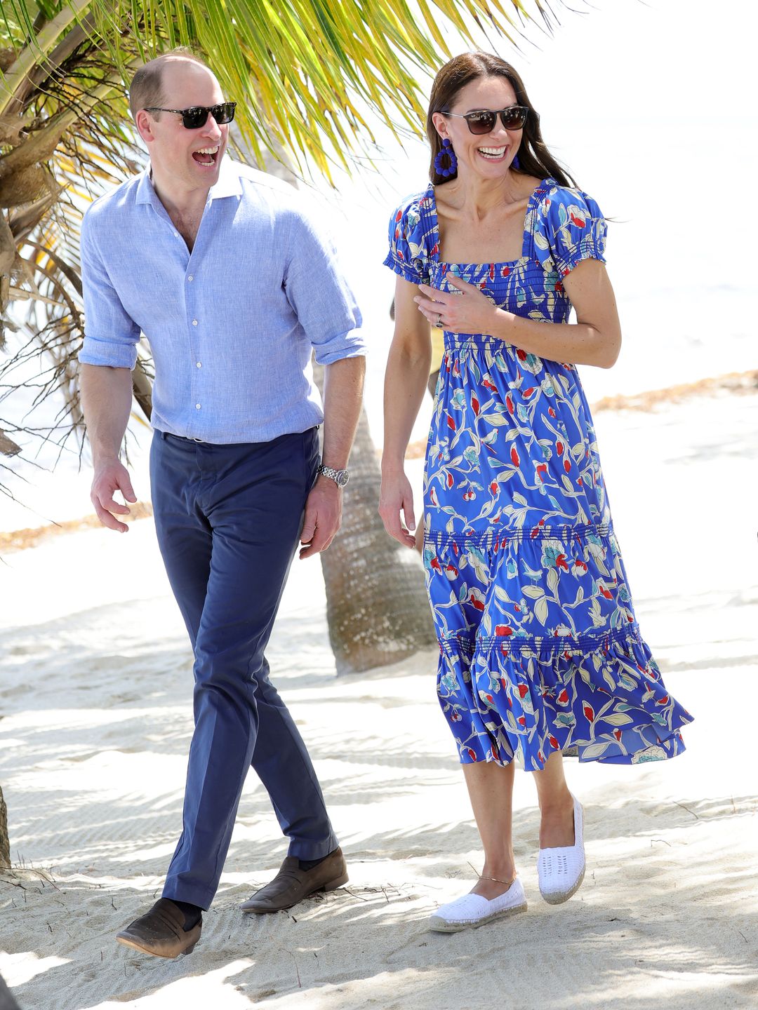 william and kate walking along beach in belize