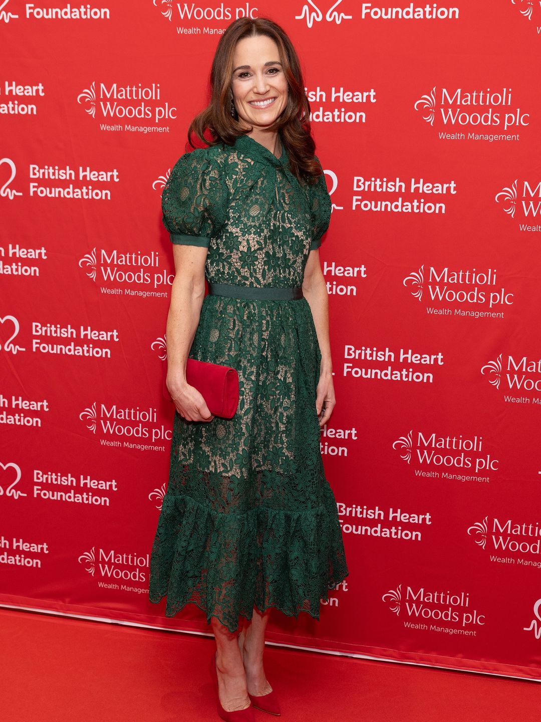 Princess Kate's sister wore a red Emily London clutch and pumps to complete her look