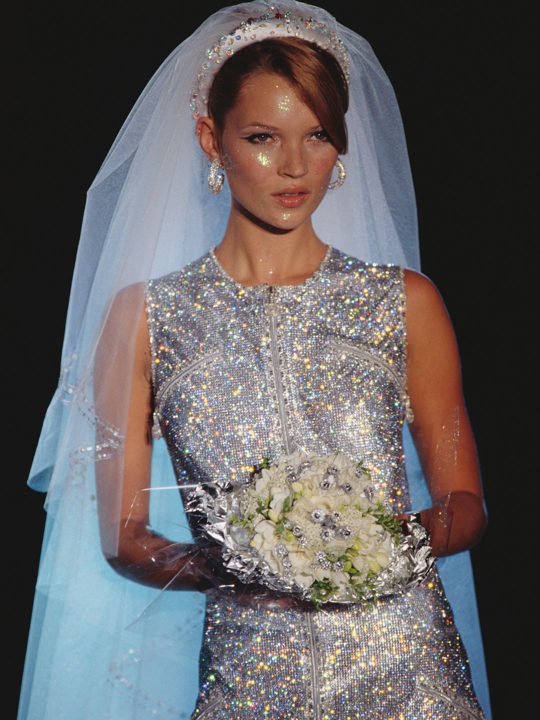 Kate Moss wearing a silver glittery wedding dress 