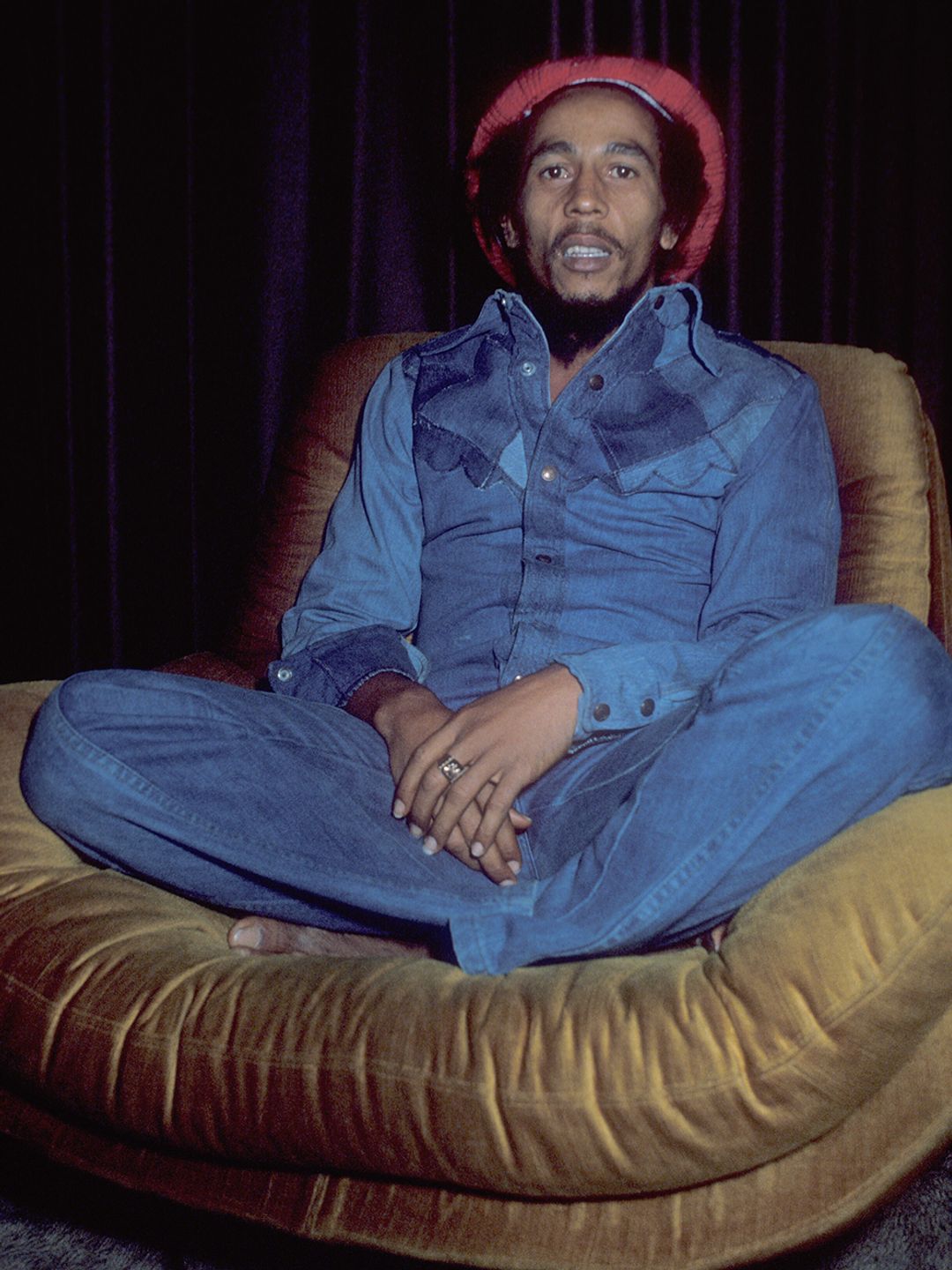 Bob Marley wearing a denim outfit 