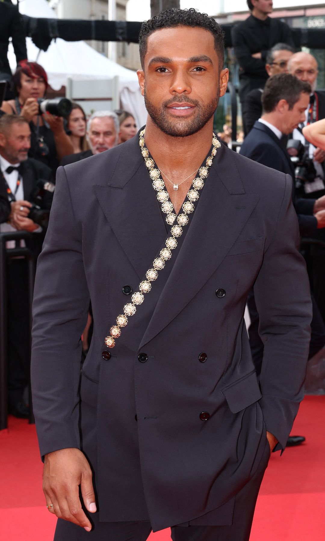 Lucien Laviscount in a suit