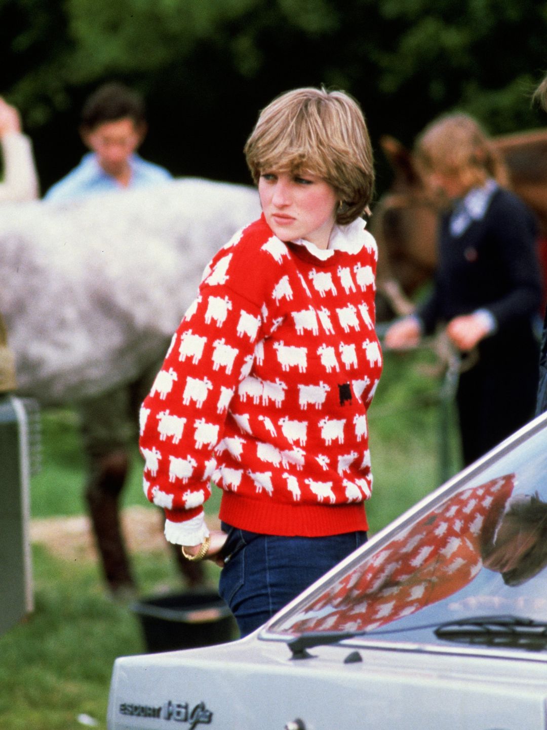 Princess Diana wearing red sheep jumper 