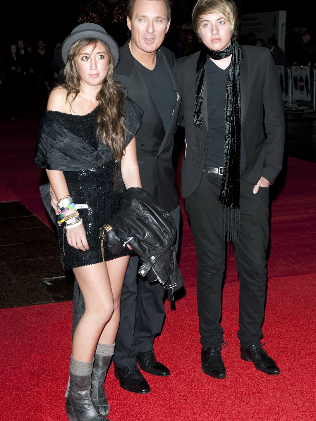 Roman and Harleymoon Kemp with their dad, Martin, at the premiere of Harry Brown