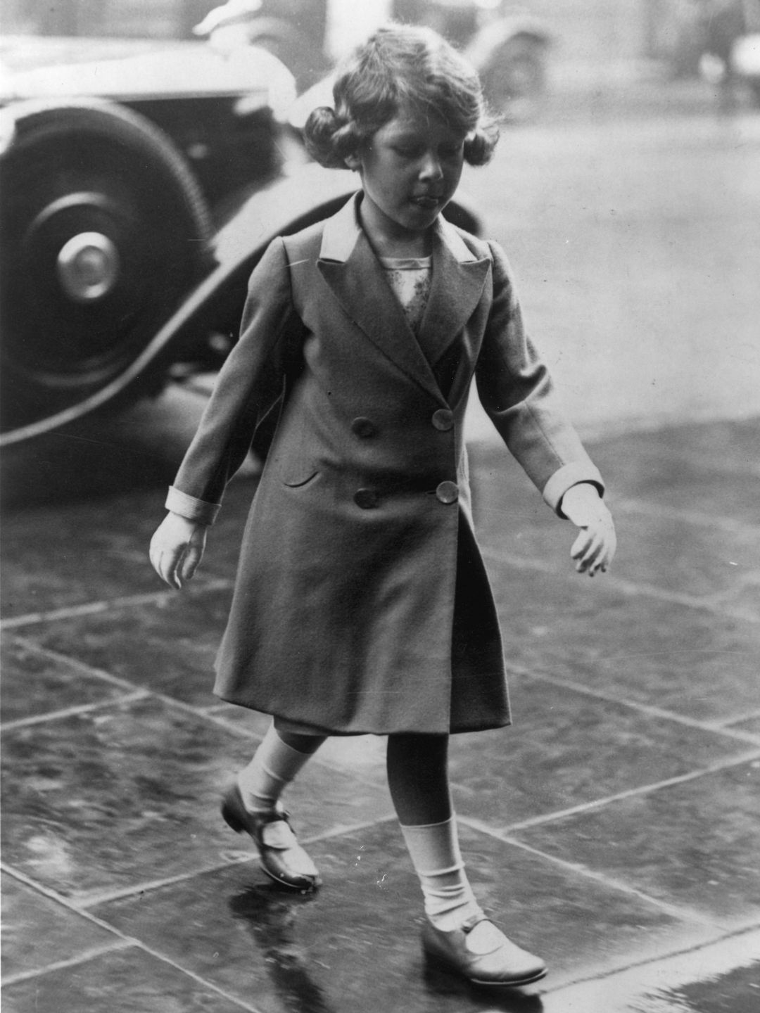 A young Queen Elizabeth walking