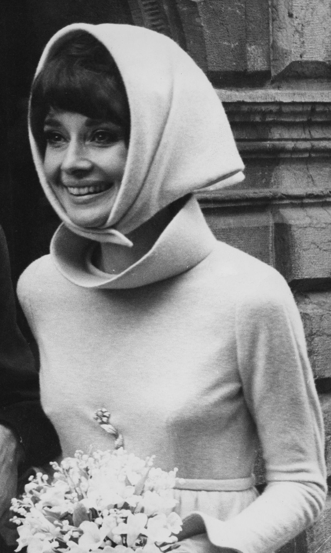 Belgian-born actress Audrey Hepburn (1929 - 1993) with her second husband, Italian psychiatrist Andrea Dotti (1938 - 2007), after their wedding, Morges, Switzerland, 18th January 1969