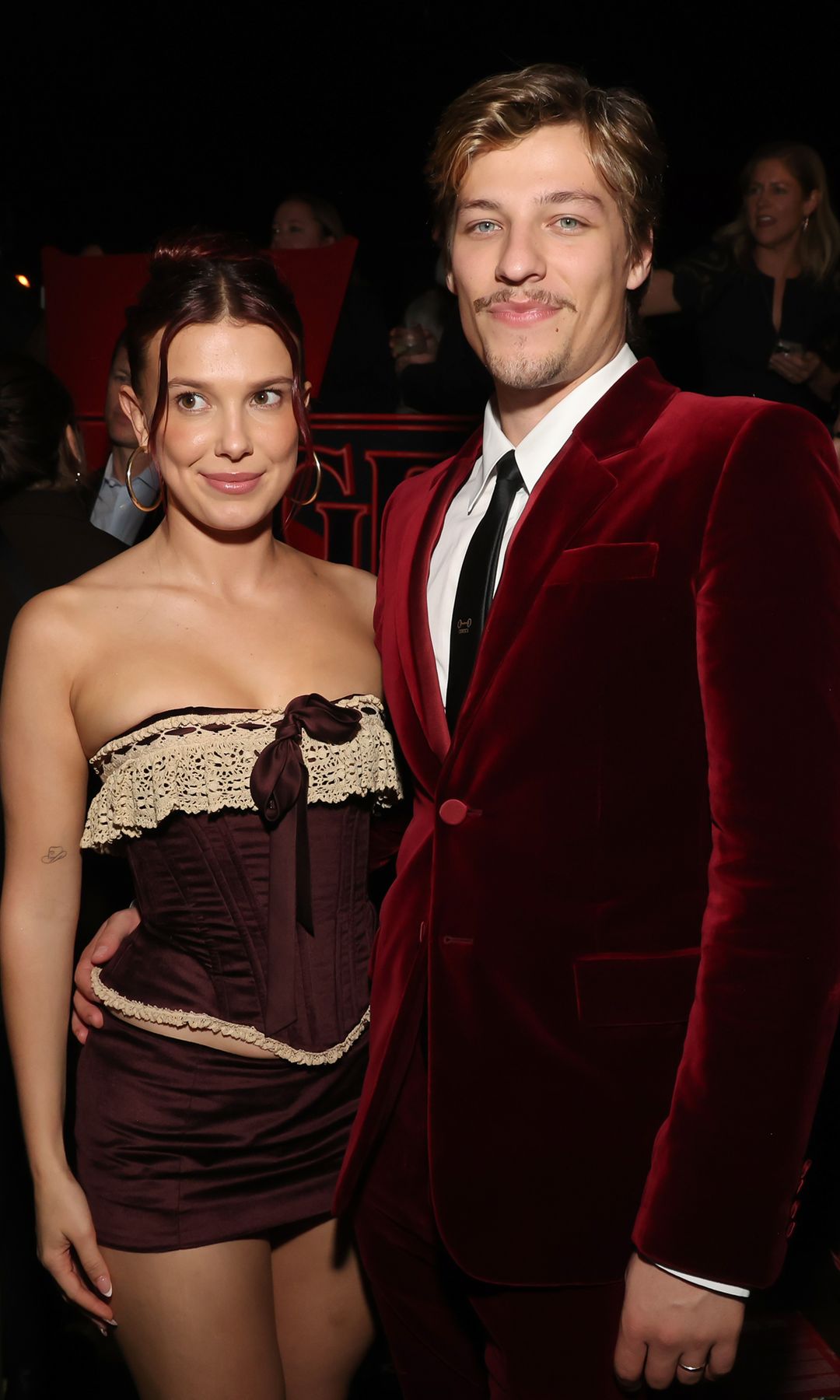 Millie Bobby Brown and Jake Bongiovi attend Netflix's "Stranger Things" Season 5 World Premiere at TCL Chinese 6 Theatres on November 06, 2025 in Hollywood, California.