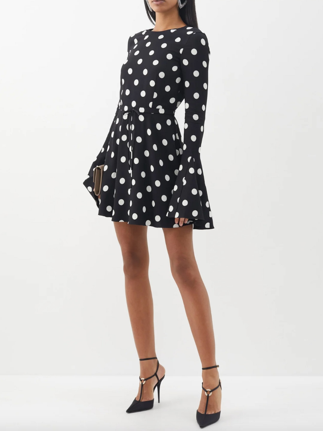 Model wearing polka dot mini dress 