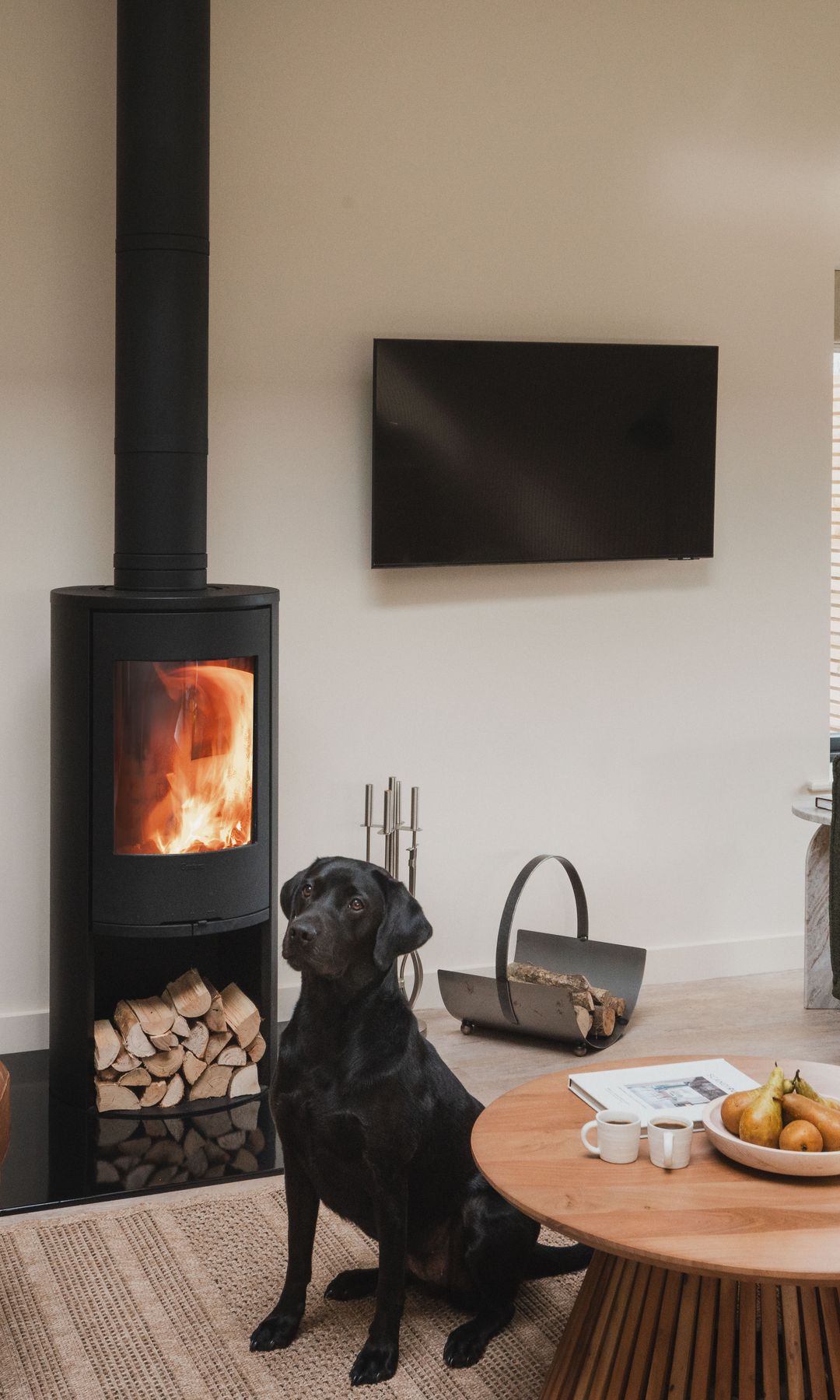 inside a barn conversion with a log burner on