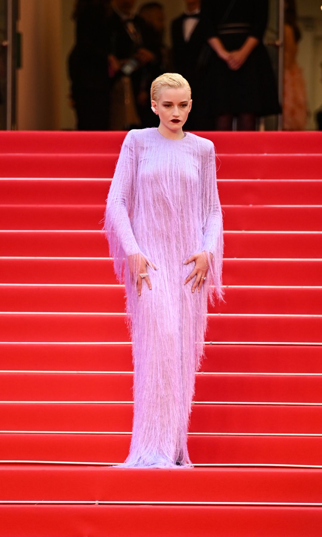 Julia Garner in a purple fringe dress