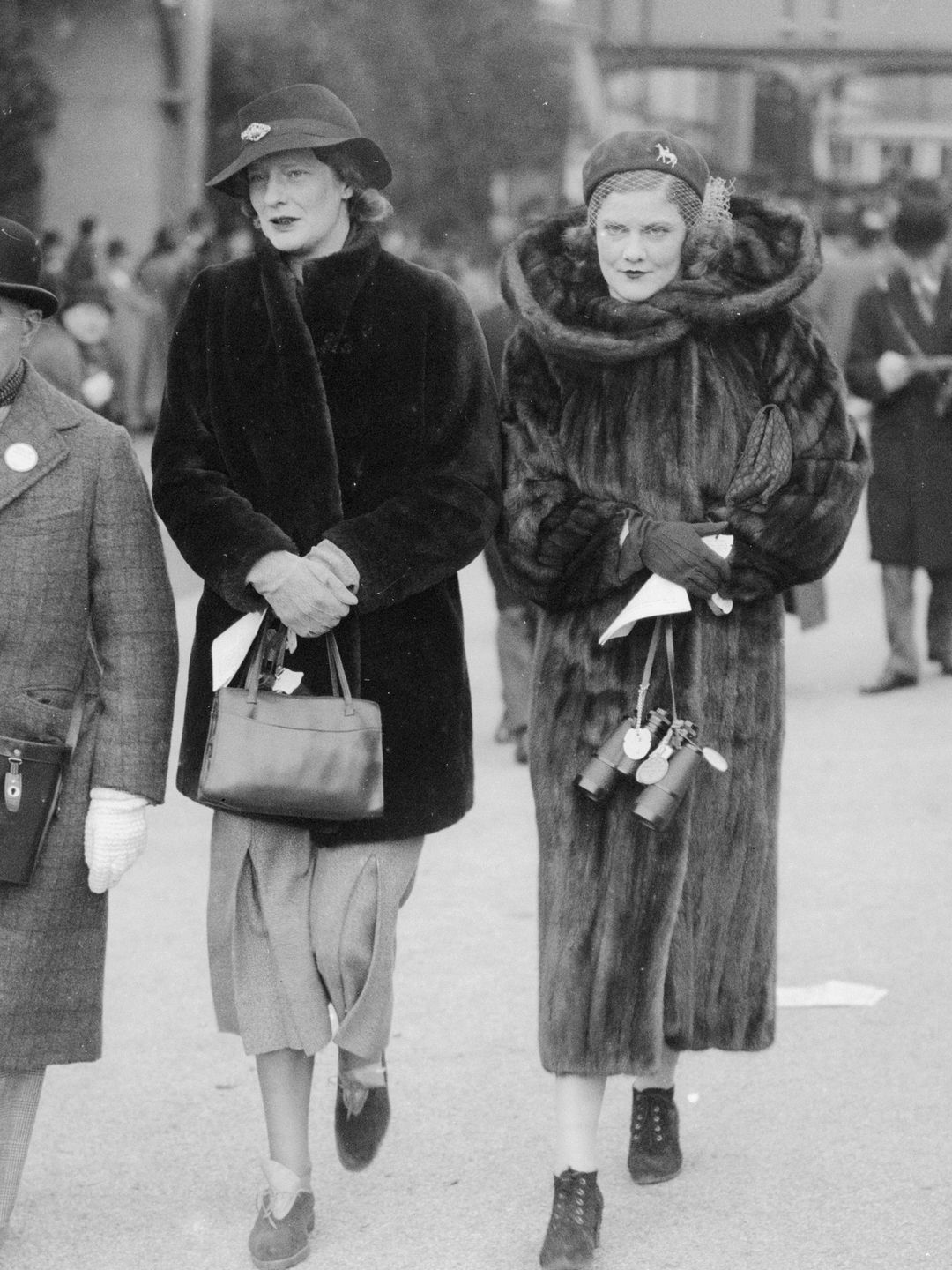 Baron De Tuyll, Lady Sybil Lygon and Lady Mary Lygon at a National Hunt meeting at Cheltenham.  (Photo by Fox Photos/Getty Images)