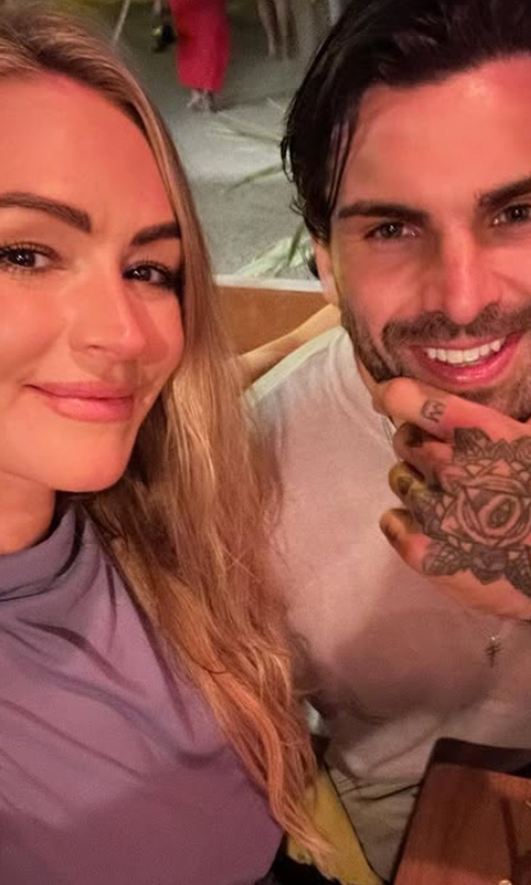 Laura Woods and Adam Collard in a restaurant