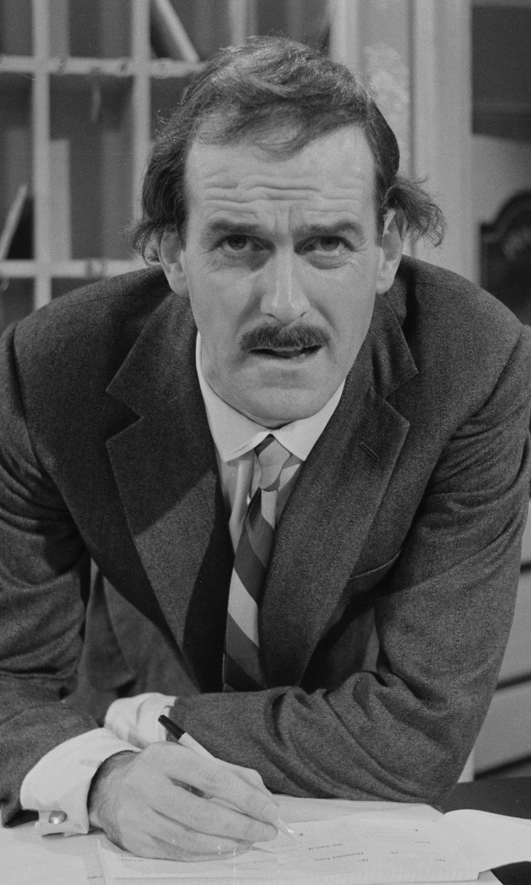 Actor John Cleese in a scene from episode 'A Touch of Class' of the BBC television sitcom 'Fawlty Towers', December 23rd 1974. (Photo by Don Smith/Radio Times via Getty Images)