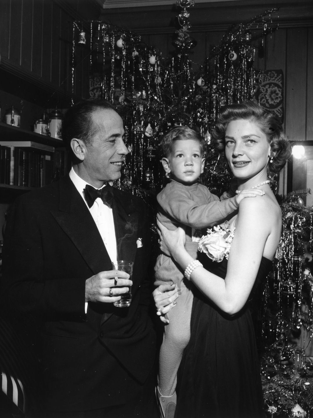 Humphrey Bogart with his wife Lauren Bacall and their son Stephen, circa 1950.