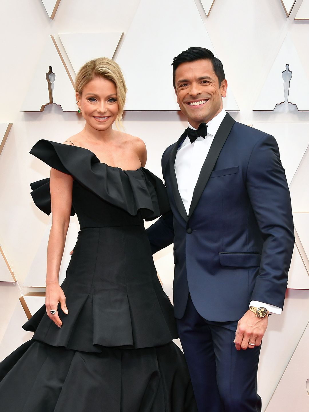 Kelly Ripa and Mark Consuelos attend the Oscars in 2023