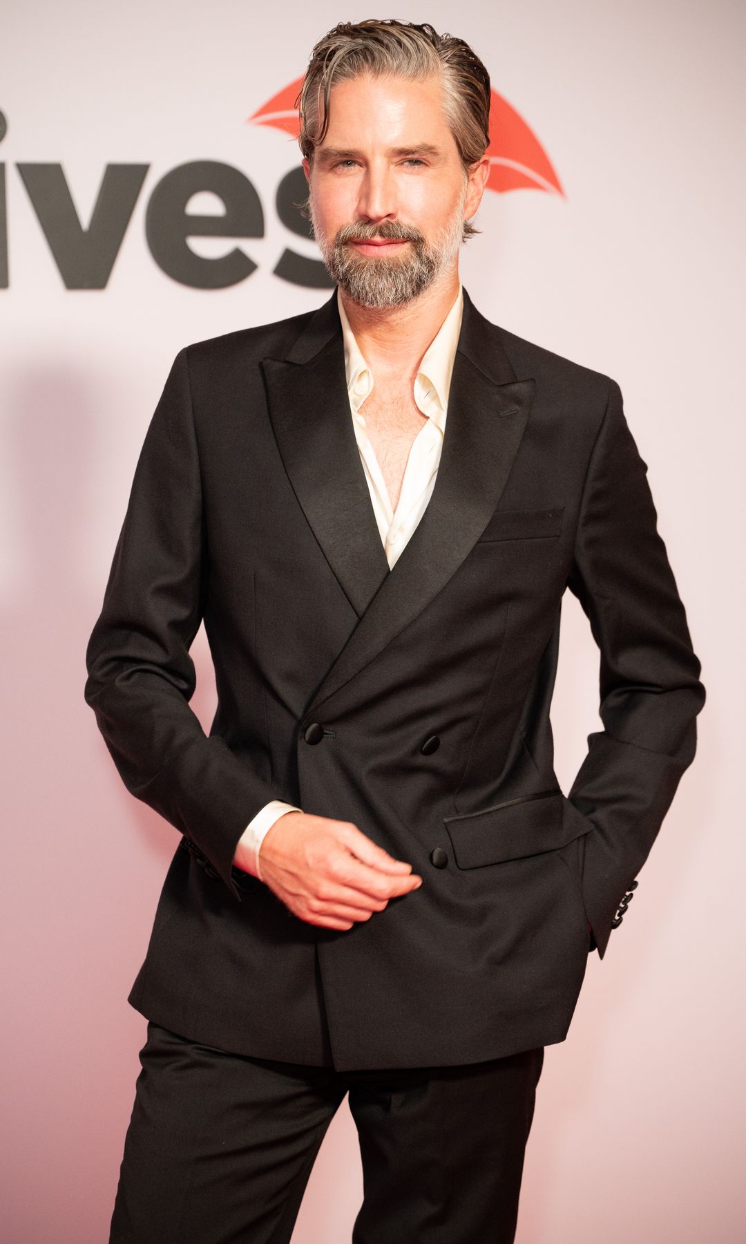 Jack Guinness in a black suit