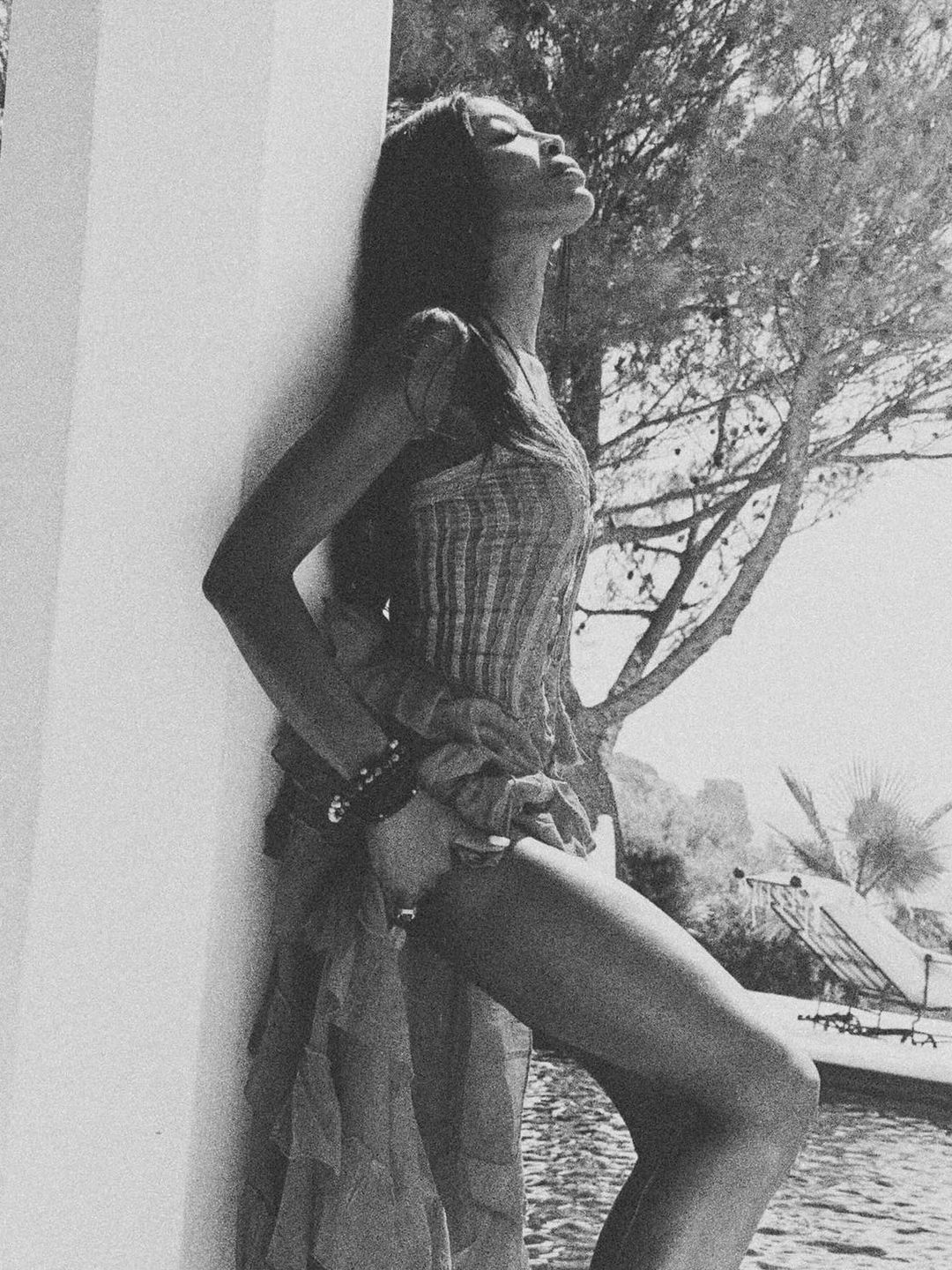 Naomi Campbell shared a black and white picture of herself in a dress while on vacation