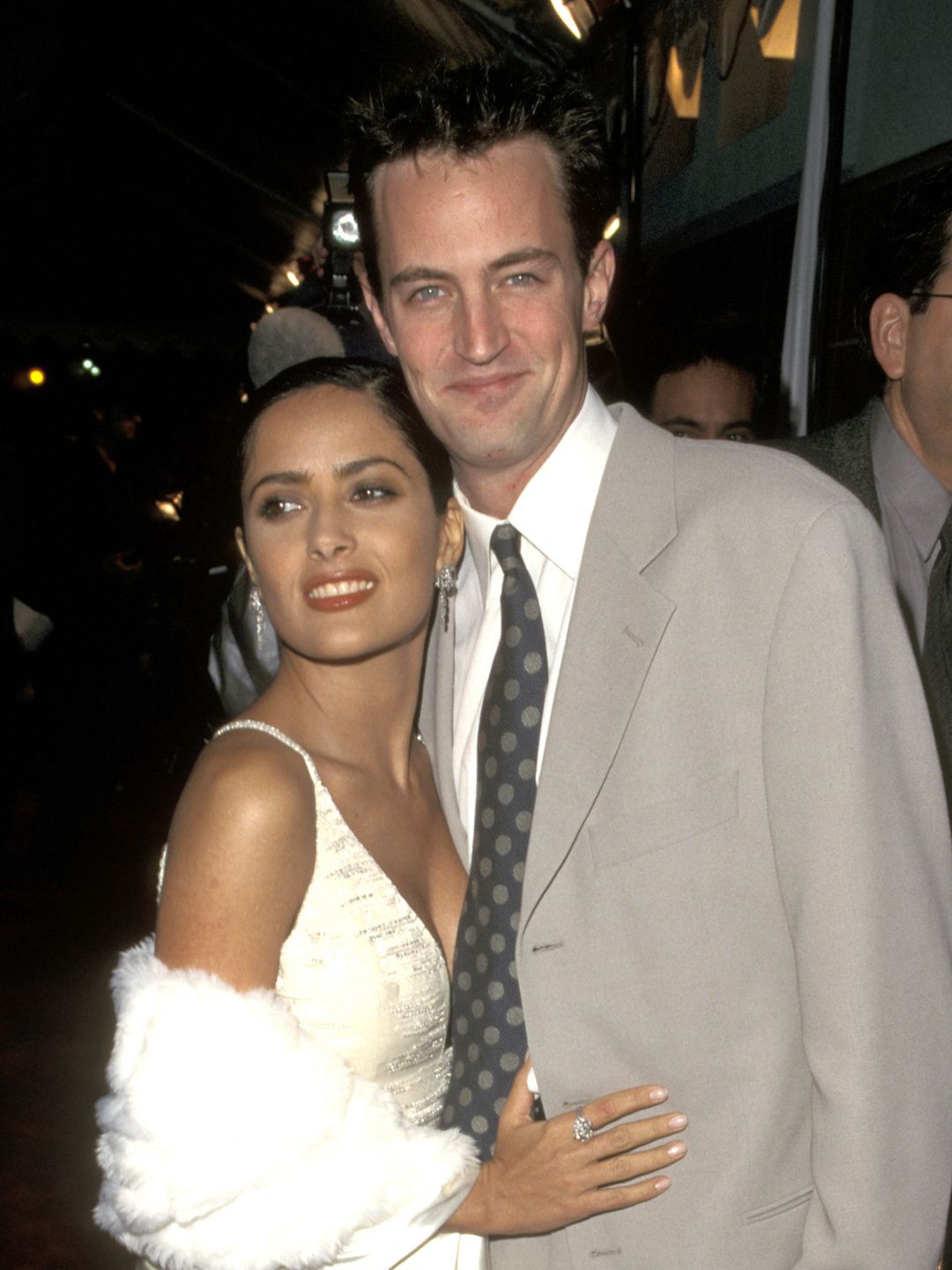 Salma Hayek and Matthew Perry at the Fools Rush in premiere in los Angeles on February 11, 1997