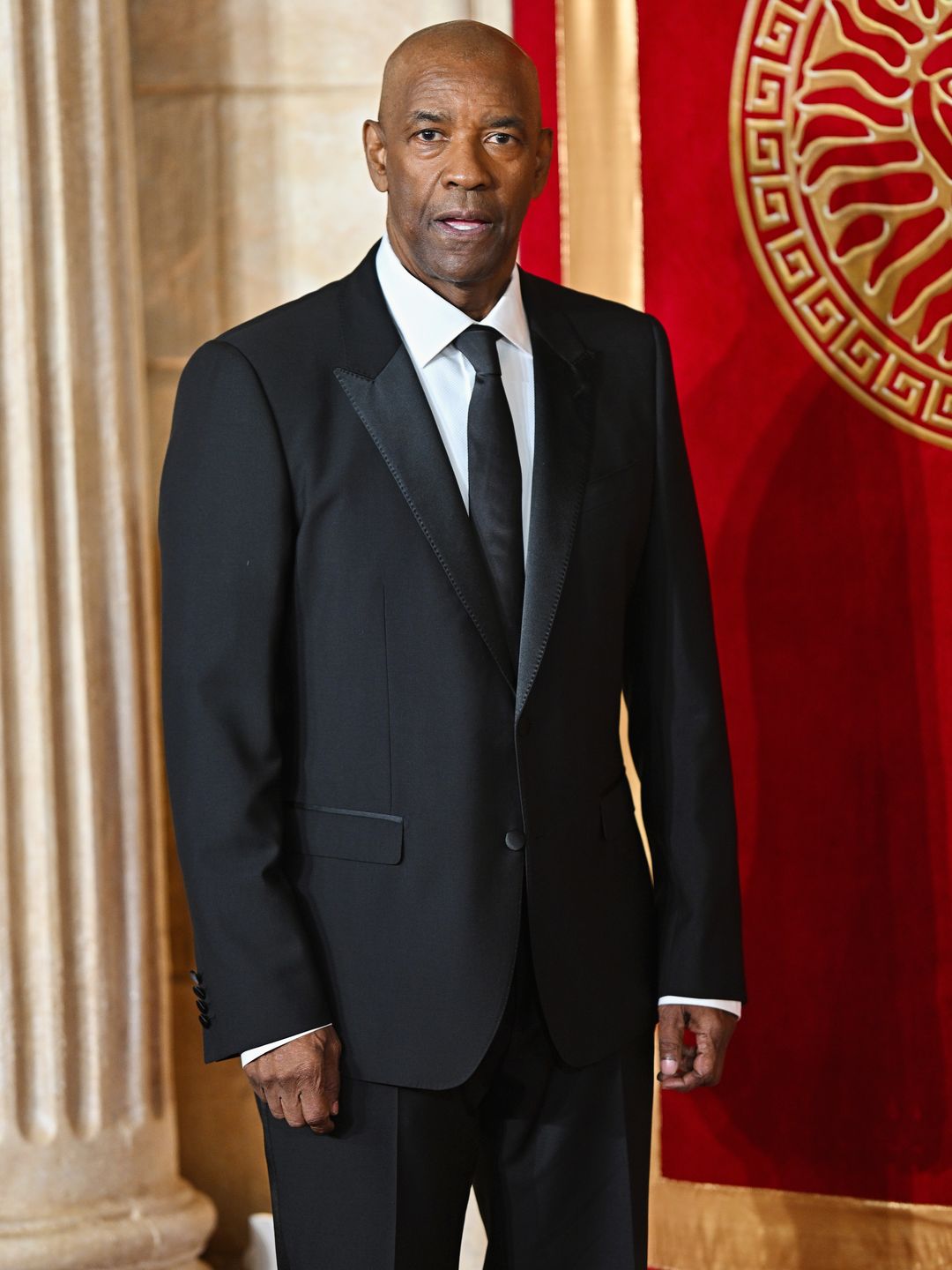 Denzel Washington in a black suit