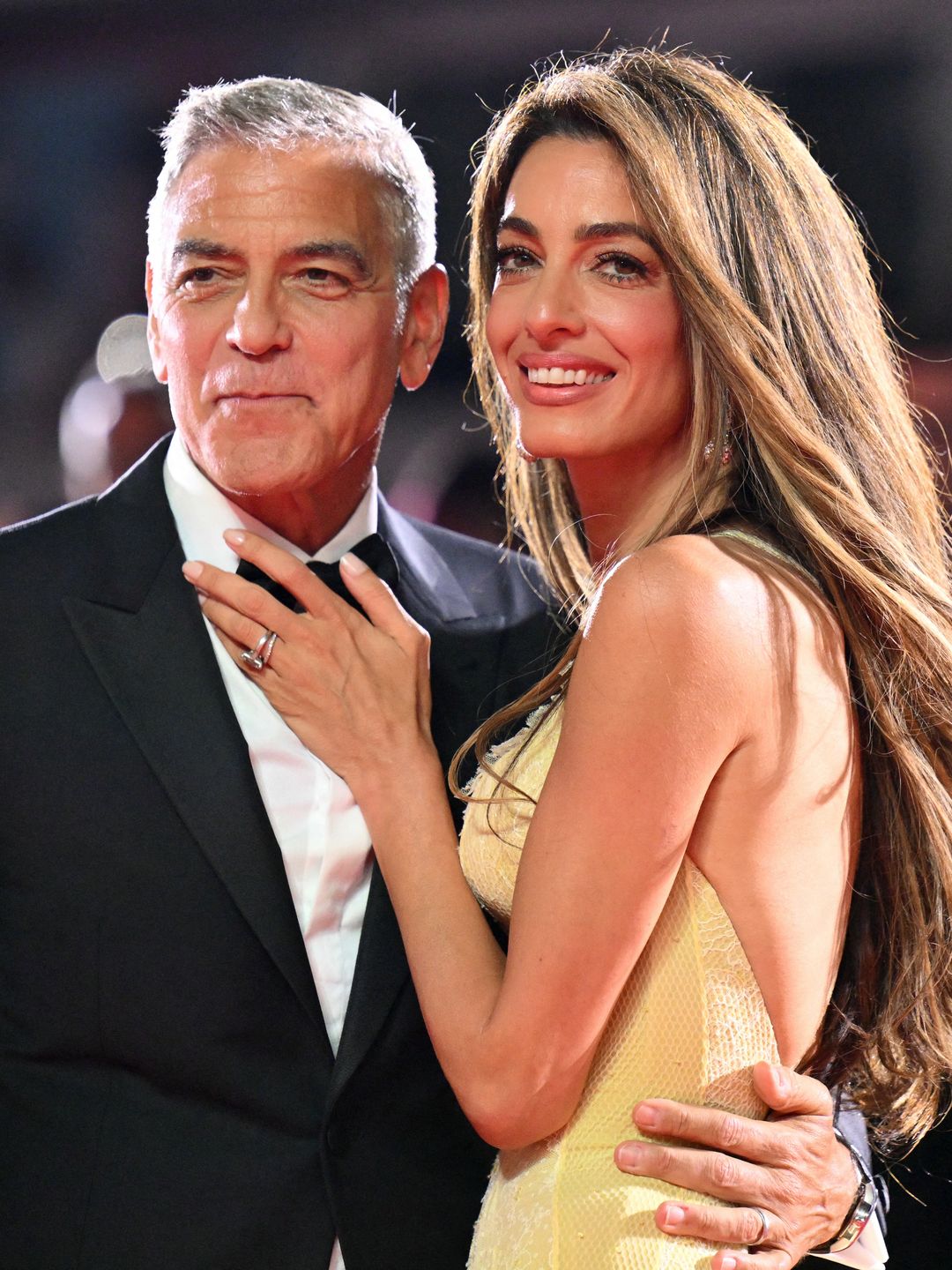 George Clooney and his wife Amal Clooney attend the red carpet of the movie "Wolfs" presented out of competition during the 81st International Venice Film Festival at Venice Lido, on September 1, 2024