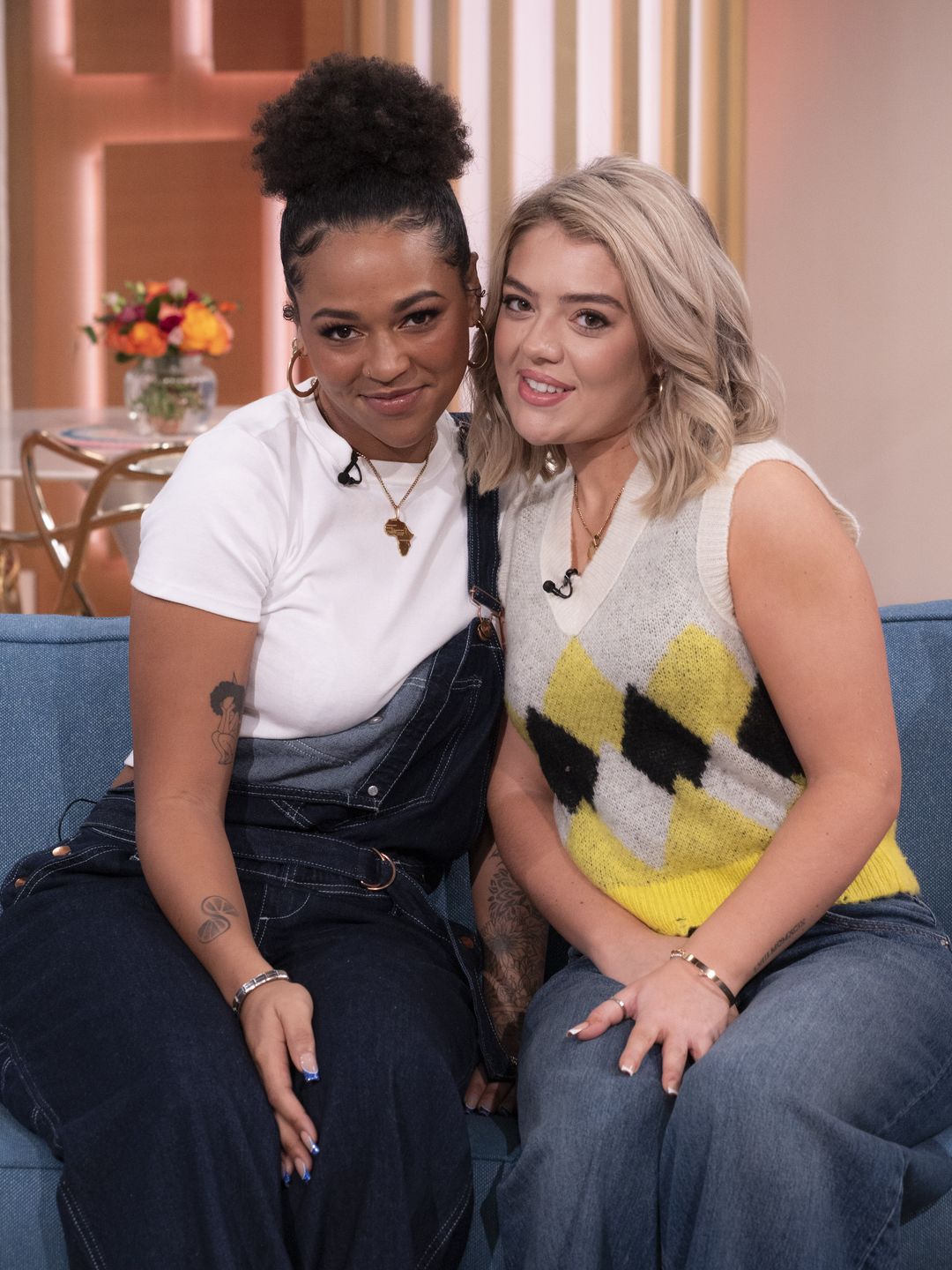 Jen & Liv sitting on a sofa