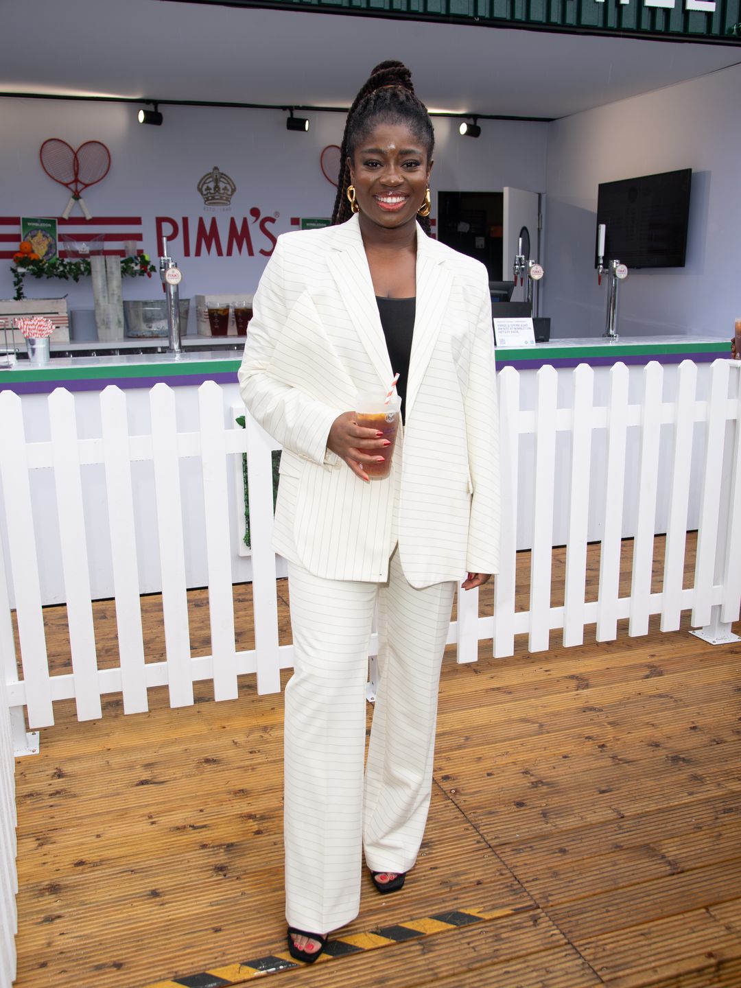 clara amfo in white suit at wimbledon